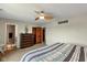 Comfortable bedroom featuring a ceiling fan, ample closet space, and neutral décor at 101 Edgewater Dr, Noblesville, IN 46062