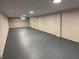 Spacious basement with painted walls and floor, ready for customization at 10328 Central Ave, Carmel, IN 46280