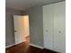 Bright bedroom with wood flooring, large closet, neutral paint and natural light at 10328 Central Ave, Carmel, IN 46280