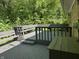 Outdoor deck with built-in benches, perfect for entertaining at 10328 Central Ave, Carmel, IN 46280