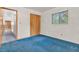 Bedroom with natural light, closet, and wood-paneled wall at 10346 Wilson Rd, Brownsburg, IN 46112