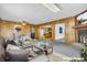 The main living area is virtually staged with modern furnishings and decor at 10346 Wilson Rd, Brownsburg, IN 46112