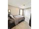 Bedroom featuring a neutral wall color, carpet floors, and a closet for storage and organization at 10847 Woodlook Ln, Indianapolis, IN 46239
