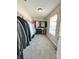 Walk-in closet with wire shelving and rods to efficiently store clothing and other personal items at 10847 Woodlook Ln, Indianapolis, IN 46239
