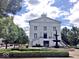 Classic town hall with a fountain, manicured greenery and a grand staircase entrance at 12860 University Cres # 1B, Carmel, IN 46032