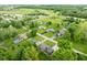 An aerial view shows the home and surrounding neighborhood at 12920 N Oakhaven Dr, Camby, IN 46113
