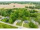 Aerial view showcases a rural and serene neighborhood setting at 12920 N Oakhaven Dr, Camby, IN 46113