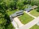 An aerial view of a two-story home with a long driveway and ample green space at 12920 N Oakhaven Dr, Camby, IN 46113