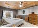 Bedroom featuring a wood ceiling, a window, and a comfortable chair at 12920 N Oakhaven Dr, Camby, IN 46113