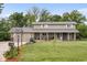 Charming two-story home with a covered front porch, a basketball hoop and a well maintained lawn at 12920 N Oakhaven Dr, Camby, IN 46113