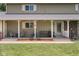 Inviting covered porch with a comfortable seating area, ceiling fans, and a welcoming atmosphere at 12920 N Oakhaven Dr, Camby, IN 46113