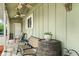 Cozy front porch featuring comfortable seating, ceiling fans, and decorative touches at 12920 N Oakhaven Dr, Camby, IN 46113
