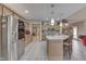 Spacious kitchen with stainless steel appliances, island, and ample cabinet space at 1344 S Fox Paw Dr, New Palestine, IN 46163
