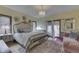 Comfortable main bedroom featuring neutral tones, unique decor, and natural light at 1344 S Fox Paw Dr, New Palestine, IN 46163