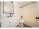 Beautiful bathroom with a vanity, mirror, shower, toilet, and updated fixtures at 1414 Dowell St, Greenwood, IN 46143