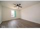 Bedroom featuring a ceiling fan and a window offering natural light at 1414 Dowell St, Greenwood, IN 46143