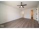 Bedroom featuring a ceiling fan and closets nearby at 1414 Dowell St, Greenwood, IN 46143