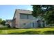 A house backyard with grass and green trees at 14170 Royalwood Dr, Fishers, IN 46037