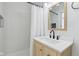 Bathroom features a light wood vanity with quartz countertop and modern fixtures at 1421 S New Jersey St, Indianapolis, IN 46225