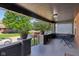 Charming covered porch with brick pillars, outdoor seating, and neighborhood views at 1421 S New Jersey St, Indianapolis, IN 46225