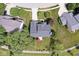 Aerial view of a home with a gray roof and red umbrella in the backyard at 14353 Chariots Whisper Dr, Carmel, IN 46074