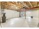 Unfinished basement with concrete floors and walls and exposed beams and utilities, offering lots of open space at 14353 Chariots Whisper Dr, Carmel, IN 46074