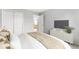 Inviting bedroom showcasing a bed, closet, and an entertainment center at 14353 Chariots Whisper Dr, Carmel, IN 46074