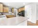 Well-lit kitchen featuring stainless steel appliances and updated cabinets at 14353 Chariots Whisper Dr, Carmel, IN 46074