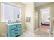 Bathroom with a window, cabinet, and walk-in shower at 17841 Grassy Knoll Dr, Westfield, IN 46074