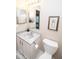 Well-lit half bathroom with a vanity sink and neutral wall color at 17841 Grassy Knoll Dr, Westfield, IN 46074