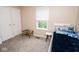 Comfortable bedroom featuring carpeted floors, two white closets and a decorated bed at 17841 Grassy Knoll Dr, Westfield, IN 46074