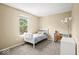 Comfortable bedroom with bright natural light, neutral carpet, and modern desk at 17841 Grassy Knoll Dr, Westfield, IN 46074