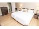 Bright bedroom with a plush bed, side tables, and views into the hall and bath at 17841 Grassy Knoll Dr, Westfield, IN 46074