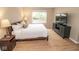 Well-lit bedroom features a large window and modern furnishings at 17841 Grassy Knoll Dr, Westfield, IN 46074