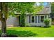 Charming home with mature trees, green lawn, and tasteful landscaping, offering pleasant curb appeal at 17841 Grassy Knoll Dr, Westfield, IN 46074
