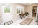Eat-in kitchen showcases natural light, backyard views and convenient outdoor access at 17841 Grassy Knoll Dr, Westfield, IN 46074