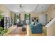 Cozy living room with hardwood floors, natural light, and comfortable sofas at 17841 Grassy Knoll Dr, Westfield, IN 46074