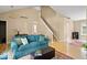 Inviting living room with hardwood floors, neutral walls, and comfortable seating at 17841 Grassy Knoll Dr, Westfield, IN 46074