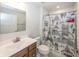 Charming bathroom with decorative shower curtain and a vanity with sink at 1863 River Birch Dr, Greenfield, IN 46140