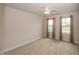 Cozy bedroom featuring neutral carpet, two windows, and ample natural light at 1863 River Birch Dr, Greenfield, IN 46140