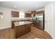 Well-equipped kitchen featuring stainless steel appliances, granite countertops, and a convenient center island at 1863 River Birch Dr, Greenfield, IN 46140