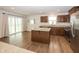 Modern kitchen with stainless steel appliances, granite counters, and an island at 1863 River Birch Dr, Greenfield, IN 46140