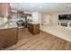 Spacious kitchen open to living area with stainless steel appliances and a center island at 1863 River Birch Dr, Greenfield, IN 46140