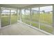 Sunroom with views of the backyard and surrounding neighborhood at 1863 River Birch Dr, Greenfield, IN 46140