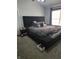 Bedroom featuring a large, plush bed and a window with natural light at 2248 Salem Park Dr, Indianapolis, IN 46239