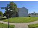 Corner lot featuring a well-manicured lawn and mature trees at 2248 Salem Park Dr, Indianapolis, IN 46239