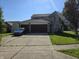 Charming two-story home with a spacious driveway and well-maintained landscaping in a suburban neighborhood at 2248 Salem Park Dr, Indianapolis, IN 46239