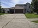 Charming two-story home with a spacious driveway and attached two-car garage at 2248 Salem Park Dr, Indianapolis, IN 46239