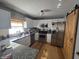 Modern kitchen with granite countertops, stainless steel appliances, and white cabinets at 2248 Salem Park Dr, Indianapolis, IN 46239