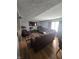 Cozy living room with plush furniture, a large TV, and ample natural light at 2248 Salem Park Dr, Indianapolis, IN 46239